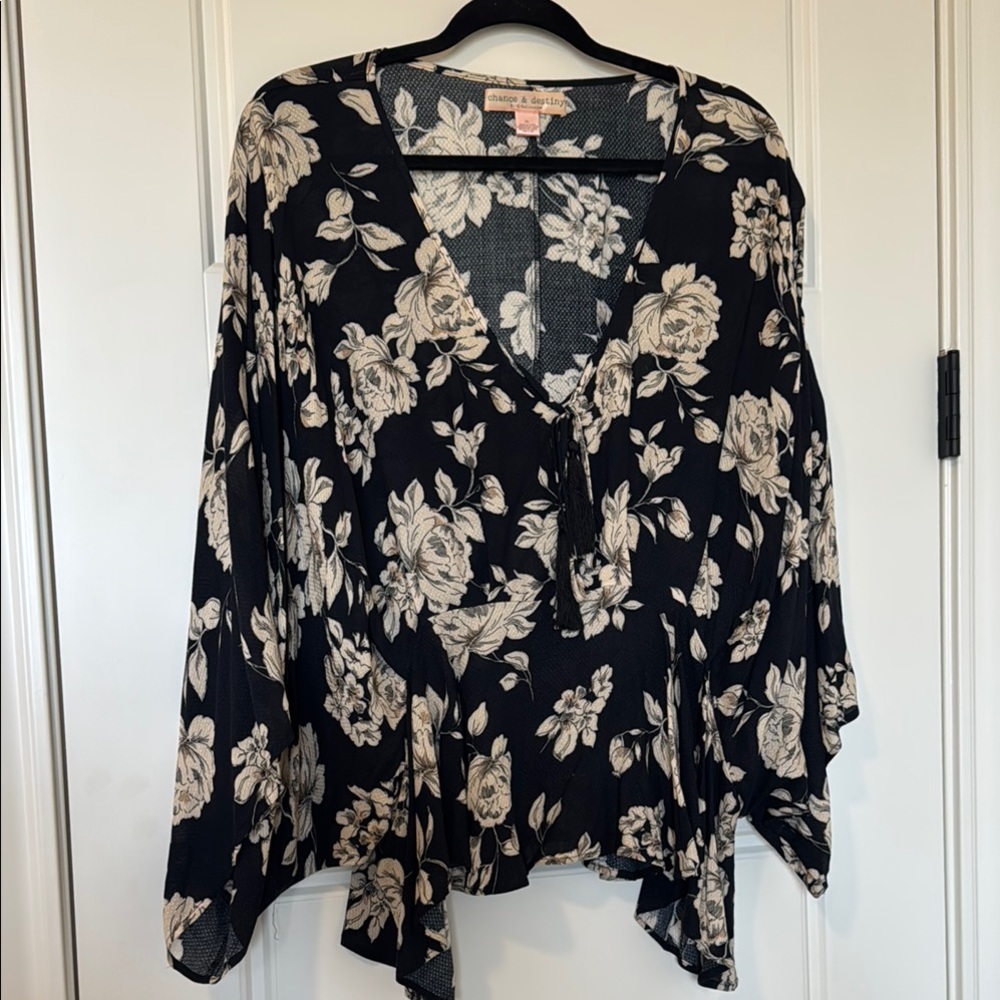 Chic Black and Cream Blouse with Elegant Design